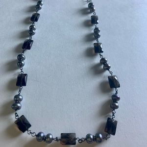 Black gemstone and sterling silver necklace